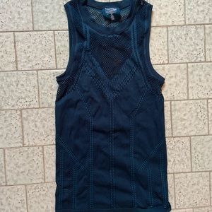 Tags removed but never worn. Athleta XS teal/black tank